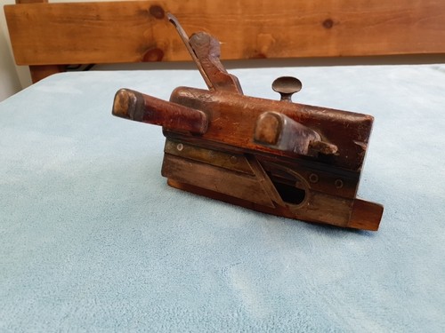 Antique wood and brass plough - and,
